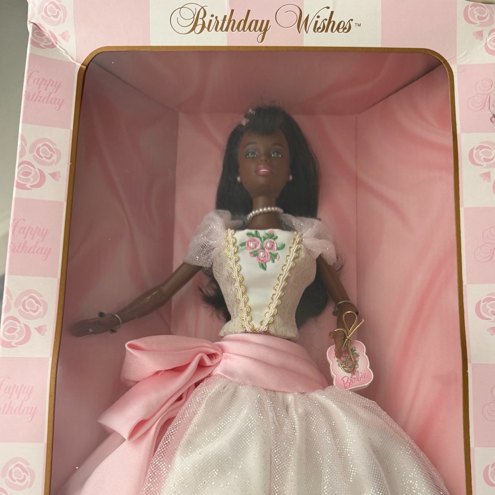 Doll with Pink and White Dress